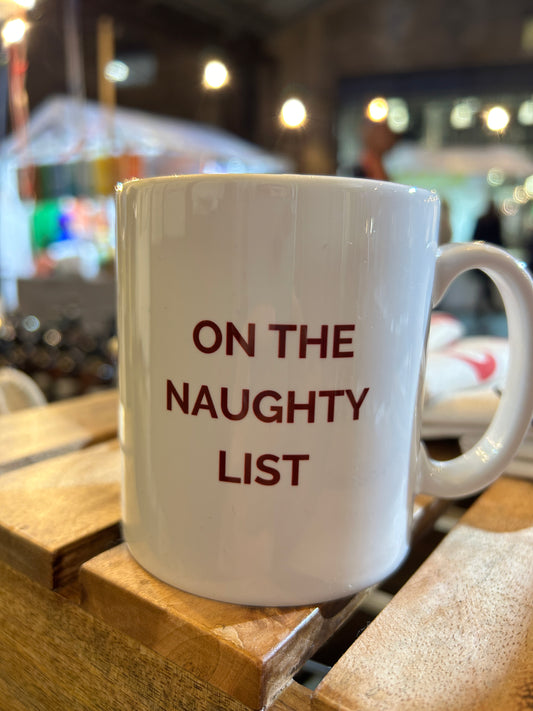 On The Naughty List mug