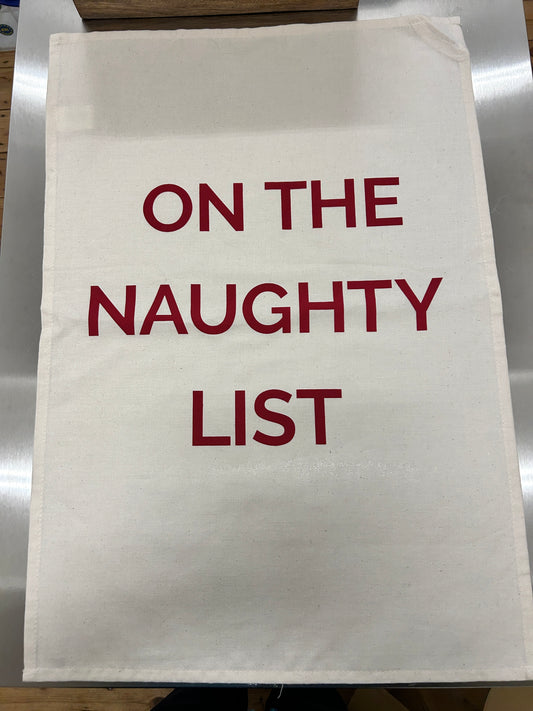 On The Naughty List Tea Towel